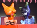 Orange fox and blue dinosaur